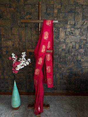 Deep red satin saree with antique gold woven elephant motifs and pallu