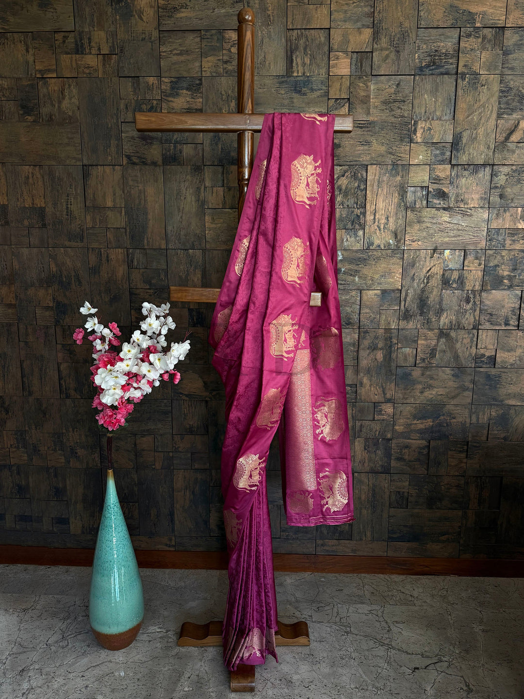 Dusty rose satin saree with rose gold woven zari elephant motifs