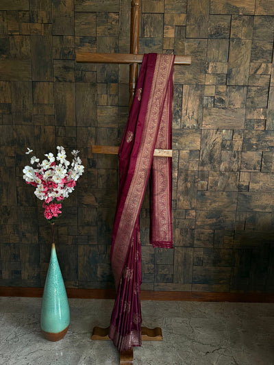 Maroon wine satin saree with antique gold floral zari motifs and border