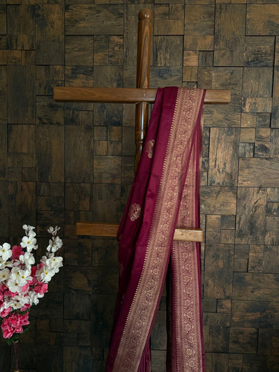Elegant festive saree in satin fabric with traditional woven pallu