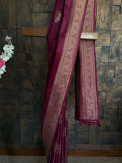 Glossy maroon saree ideal for rituals and engagement ceremonies