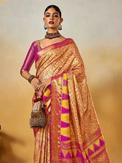 Beige–Magenta Banarasi satin silk saree with zari work and woven parrot motifs, styled for traditional Indian wedding rituals with luxury finish. Beige–Magenta Banarasi satin silk saree with zari work and woven parrot motifs, styled for traditional Indian wedding rituals with luxury finish..