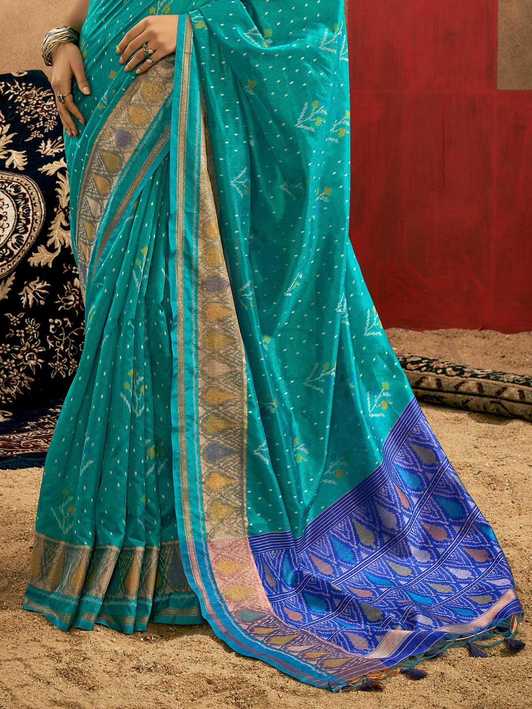 Teal Blue–Royal Blue Banarasi silk saree with Patola-inspired design and rich zari border, styled for wedding glamour and traditional elegance. Teal Blue–Royal Blue Banarasi silk saree with Patola-inspired design and rich zari border, styled for wedding glamour and traditional elegance..