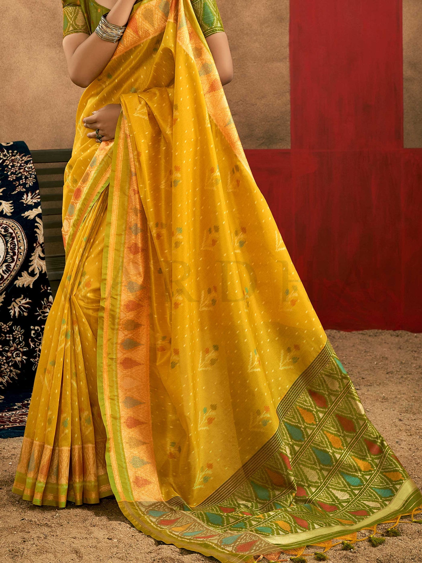 Sunflower Yellow–Leaf Green Banarasi silk saree with Patola-inspired design and rich zari border, styled for wedding glamour and traditional elegance. Sunflower Yellow–Leaf Green Banarasi silk saree with Patola-inspired design and rich zari border, styled for wedding glamour and traditional elegance..