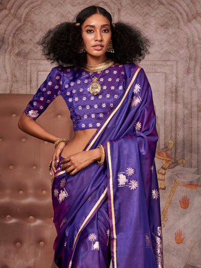 Luxury Aubergine Purple Banarasi Saree with Exquisite Floral Zari Motifs, offering a Lustrous Satin Silk Drape for Bridal & Ethnic Fashion Enthusiasts.
