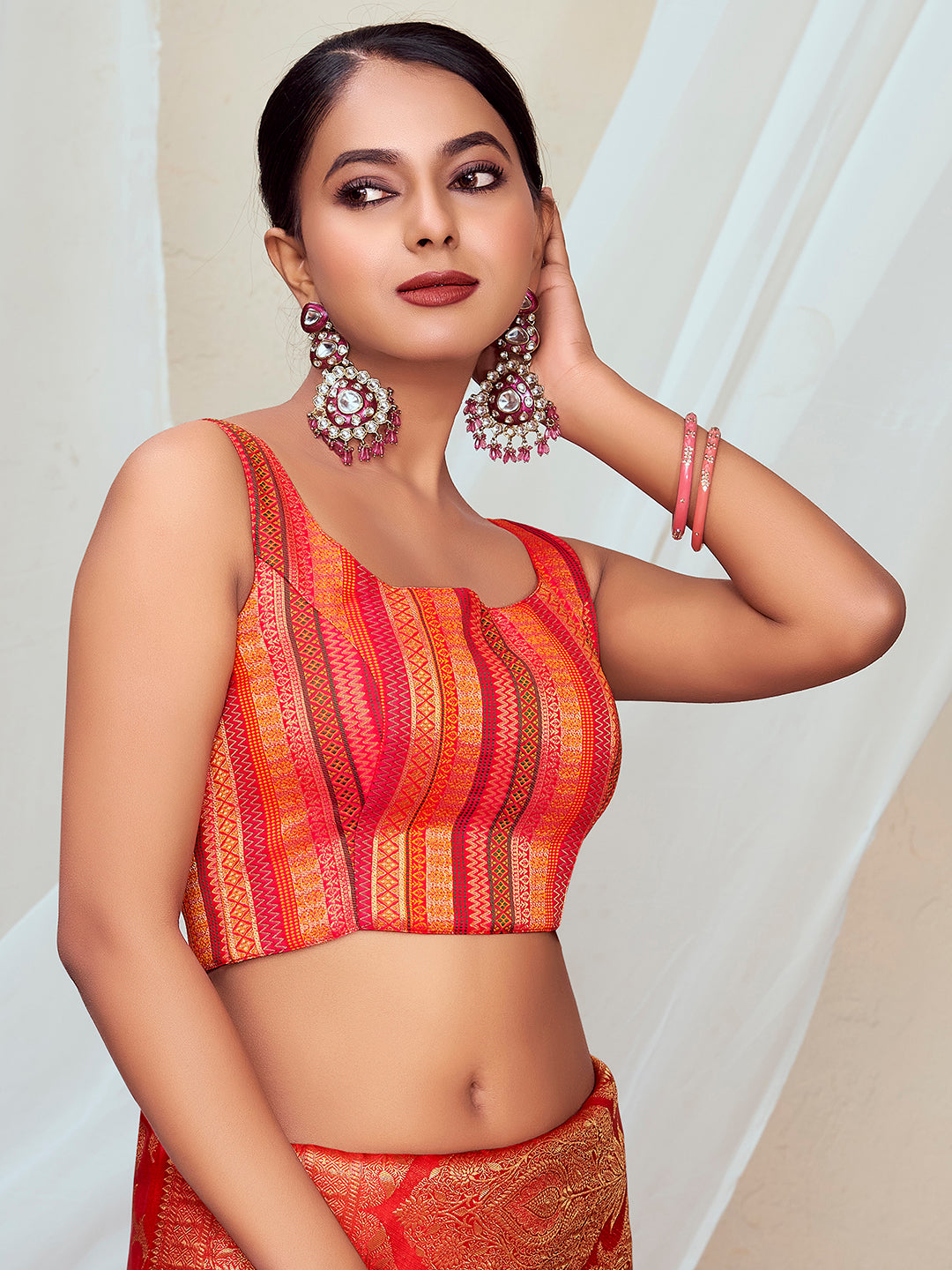 Orange Round Neck Sleeveless Padded Blouse with Gold Zari