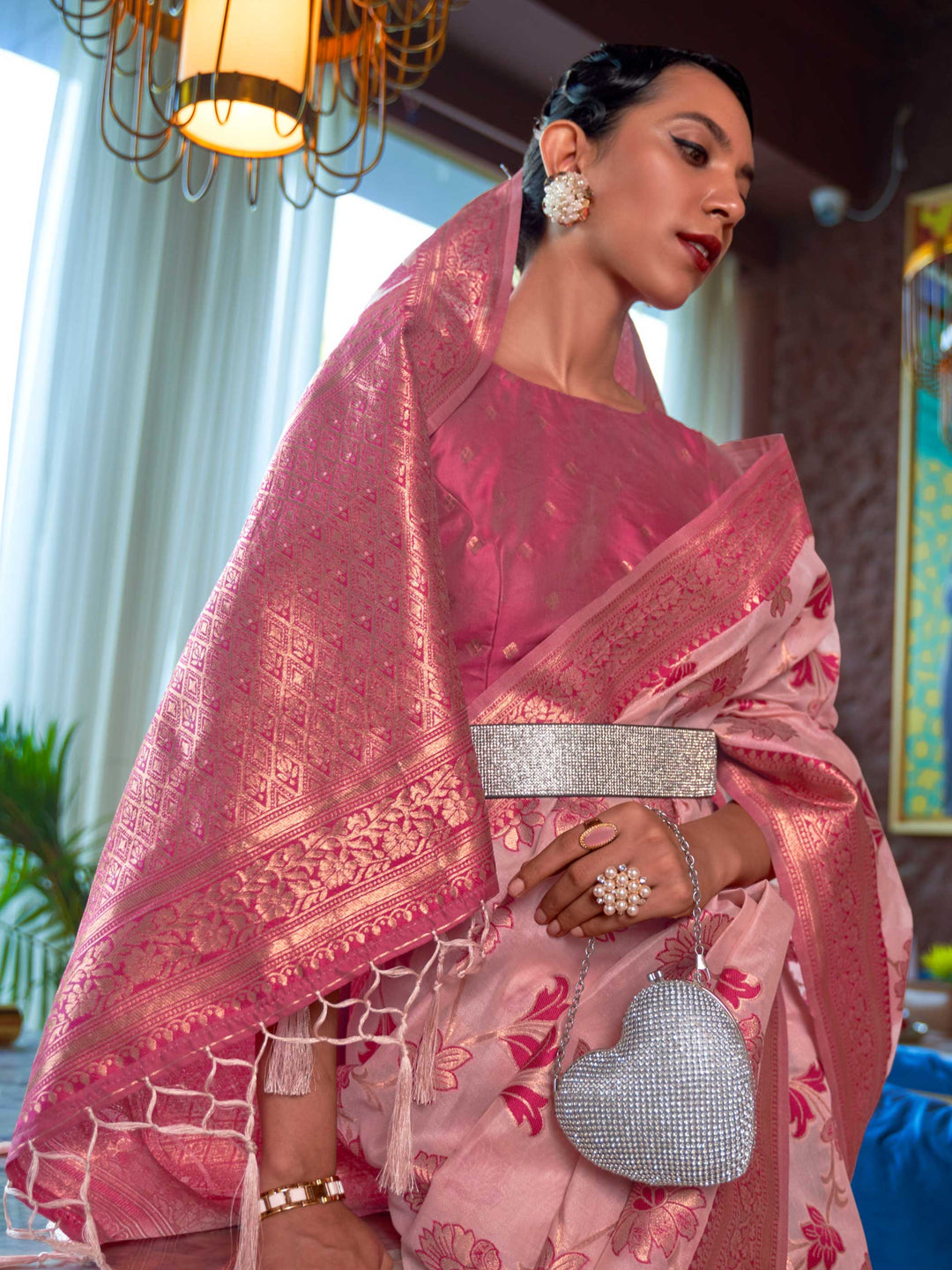 Designer Baby Pink Organza Saree featuring Gottapatti Lace and Mirror Work Border, providing an Elegant Silhouette—perfect for Wedding Ceremonies and High-End Gatherings. 
