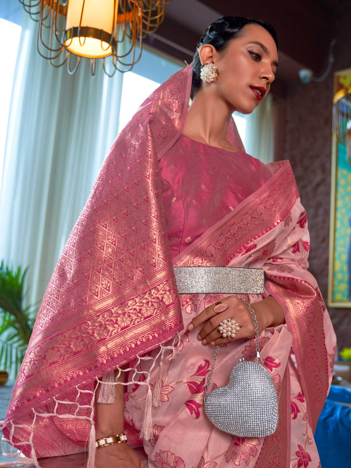 Designer Baby Pink Organza Saree featuring Gottapatti Lace and Mirror Work Border, providing an Elegant Silhouette—perfect for Wedding Ceremonies and High-End Gatherings. 

