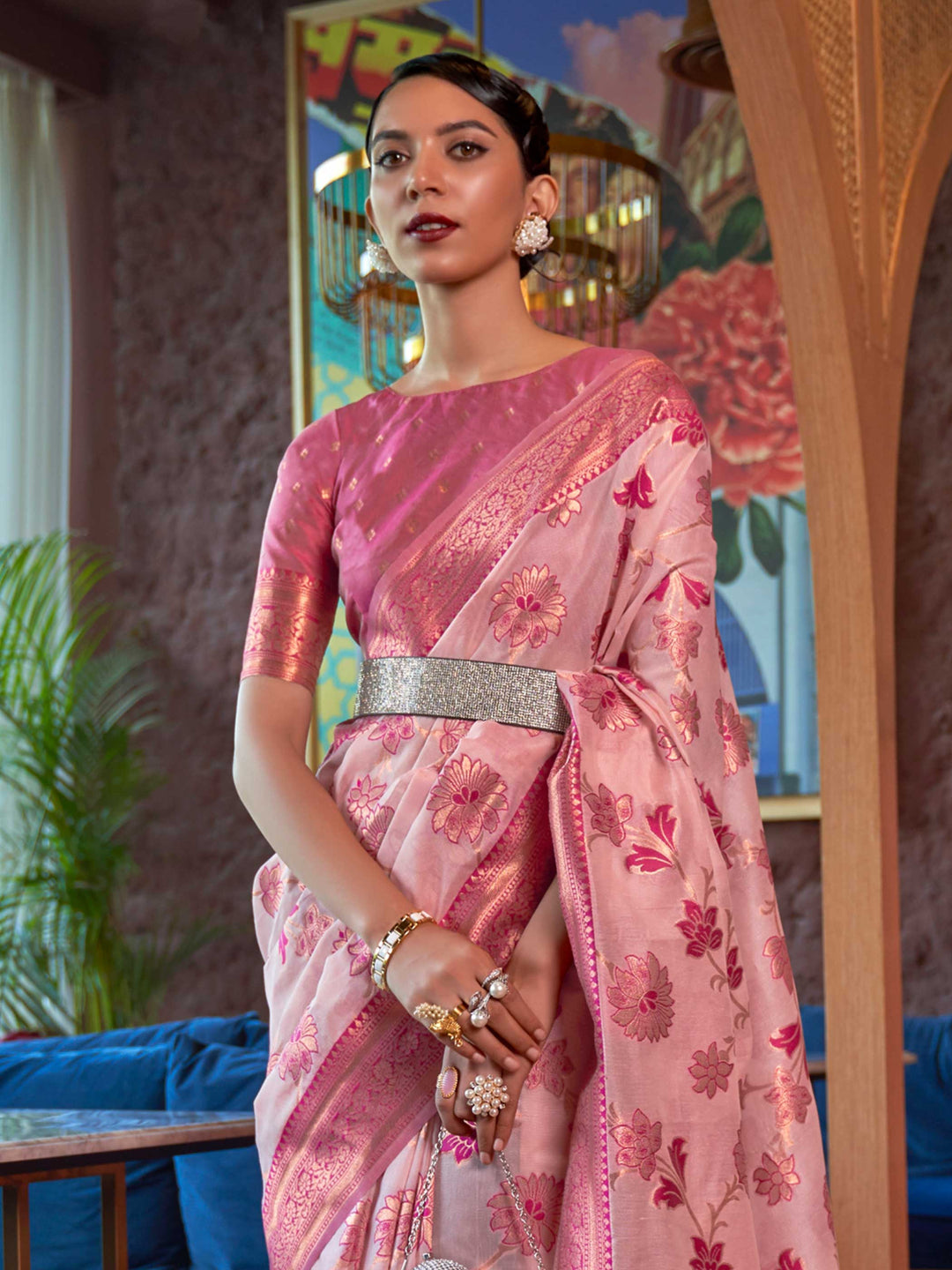 Handcrafted Baby Pink Organza Chikankari Saree with Zari Lucknowi Handloom Weaving and a Contrast Woven Border, showcasing Traditional Phool Bel Motifs—a statement piece for Cultural Celebrations and Special Events. 
