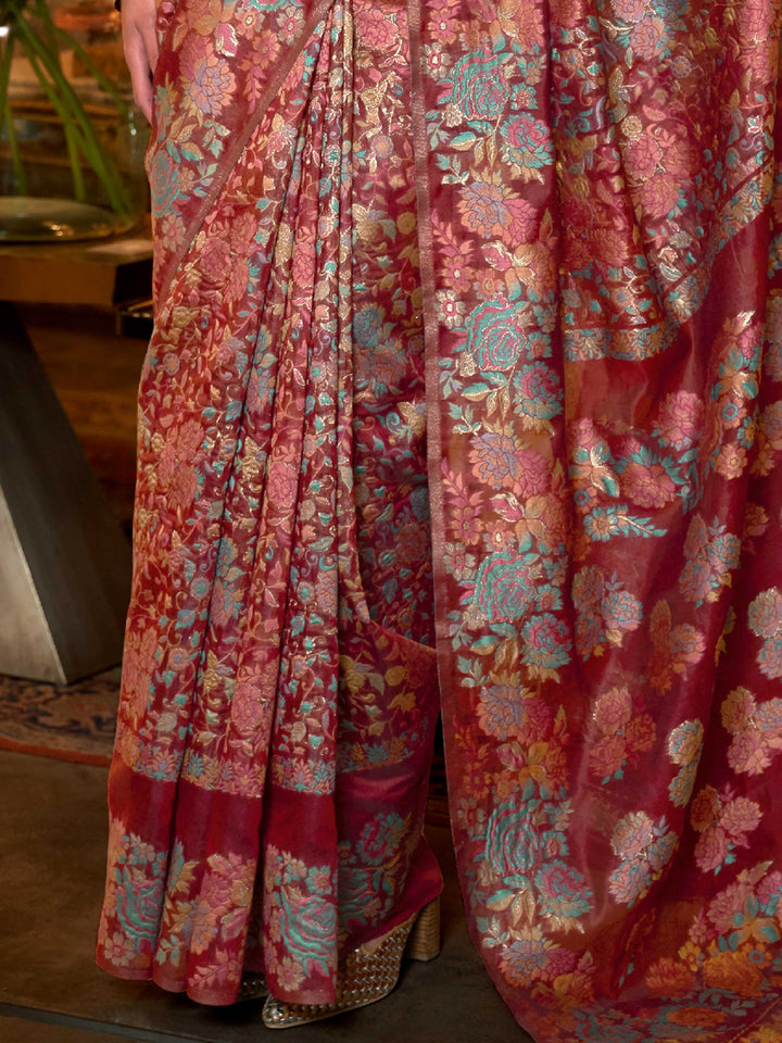 Luxurious Barn Red Floral Kashmiri Modal Handloom Saree with a Borderless Weave and Artistic Handcrafted Details, ensuring a Comfortable and Stylish Drape—suitable for Traditional Functions and Modern Festivities.