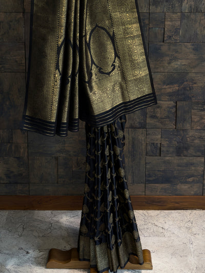 Satin silk Banarasi saree in black with intricate woven zari design for festive occasions