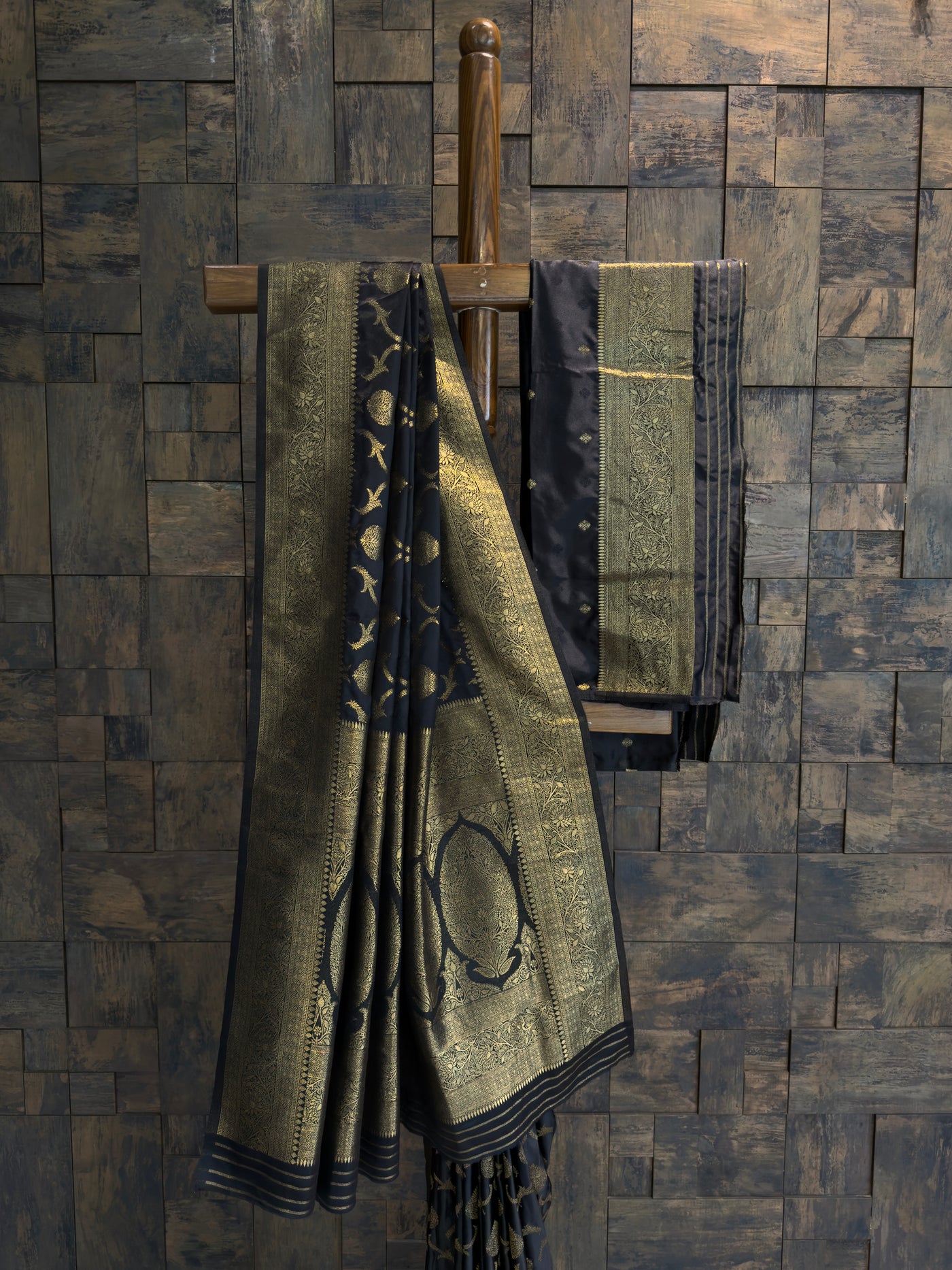 Traditional Banarasi satin silk saree in black shade with woven gold zari accents