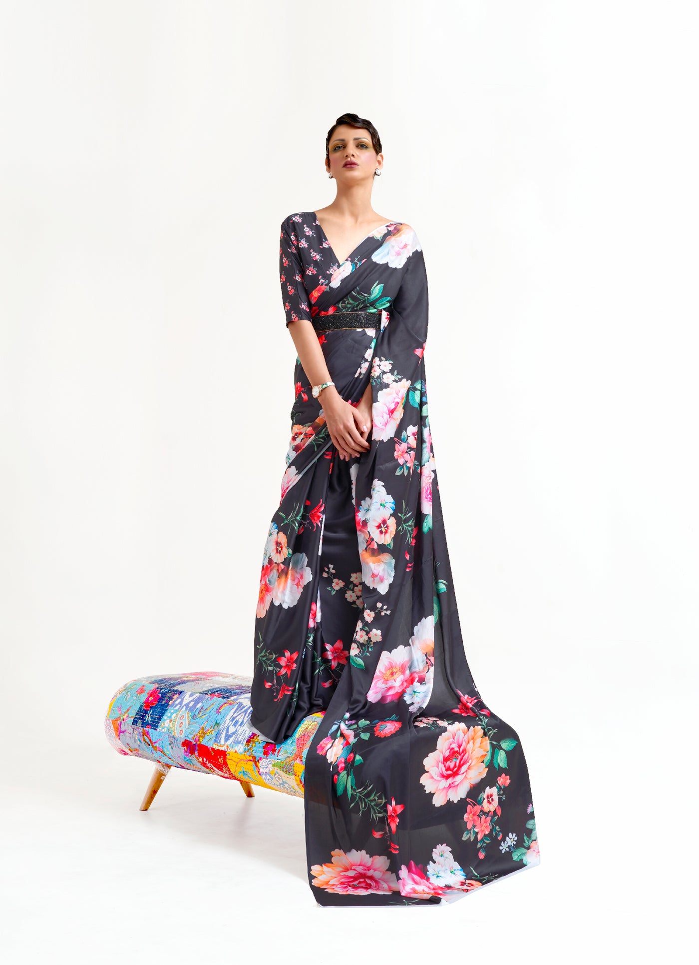 Black, white, and pink digital printed soft crepe saree with Bollywood-style drape and floral patterns, perfect for festive occasions.