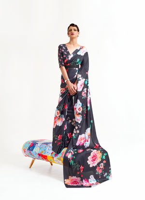 Black, white, and pink digital printed soft crepe saree with Bollywood-style drape and floral patterns, perfect for festive occasions.