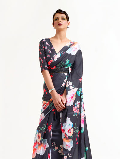 Elegant black, white, and pink soft crepe saree adorned with digital floral designs and Bollywood drape, suitable for special events.