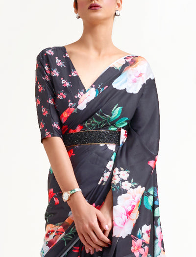 Chic black and white-pink digital printed crepe saree with Bollywood-style drape and floral motifs, perfect for parties and gatherings.