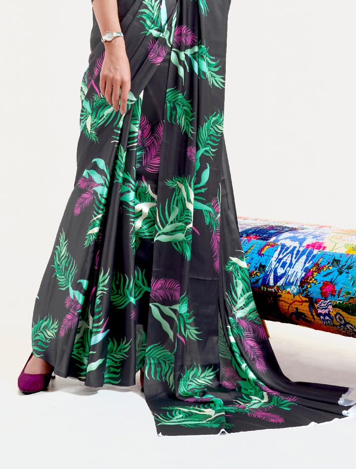 Chic black and pastel green-white digital printed crepe saree with Bollywood-inspired drape and floral designs for festive occasions