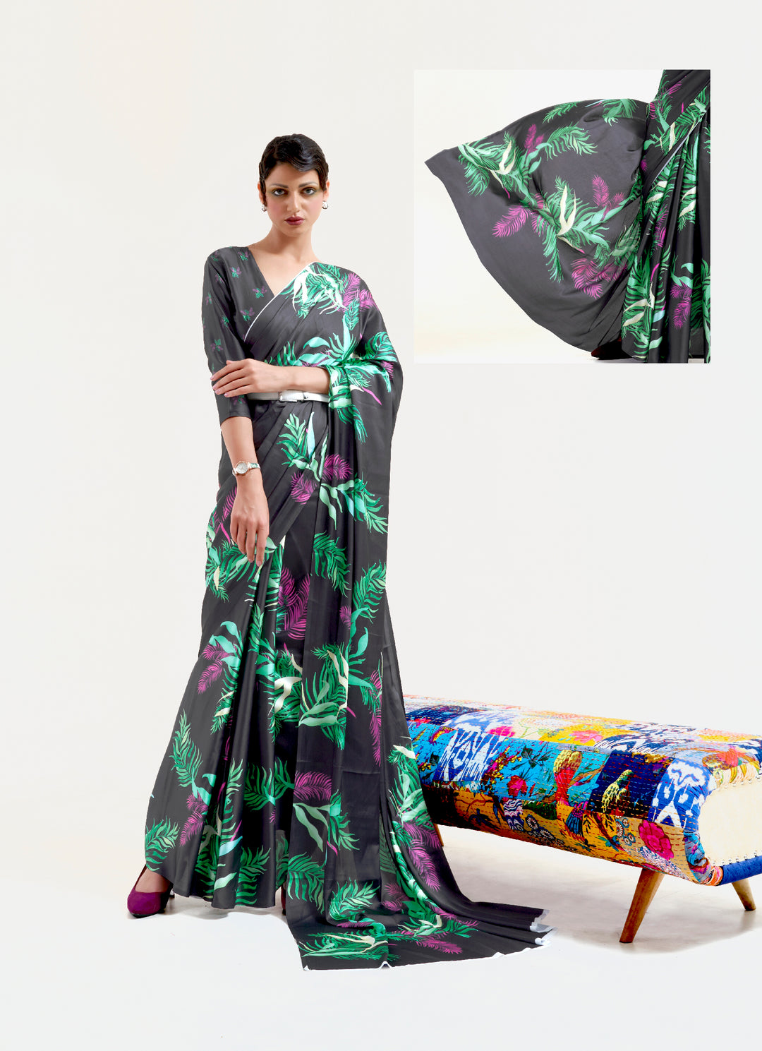 Stylish black and pastel green-white crepe saree showcasing digital floral prints and Bollywood drape, perfect for cultural celebrations.