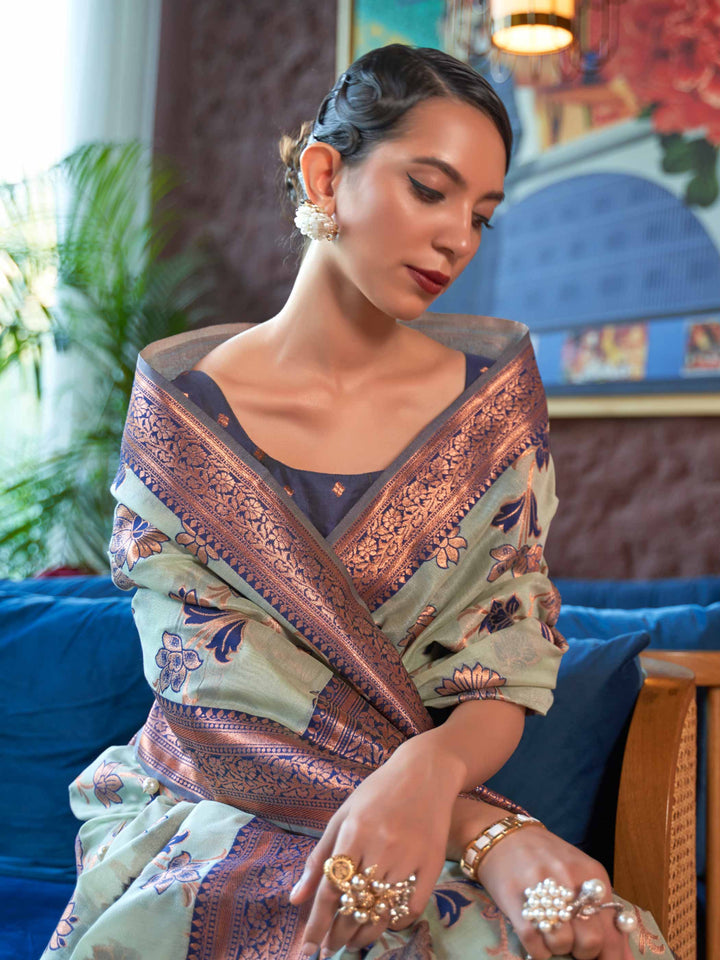 Designer Blue Organza Saree featuring Gottapatti Lace and Mirror Work Border, providing an Elegant Silhouette—perfect for Wedding Ceremonies and High-End Gatherings. 
