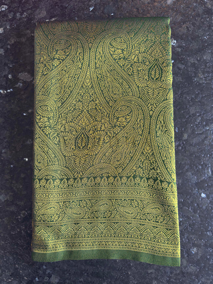Authentic Indian ethnic wear featuring a radiant Bottle Green Golden Zari Kanjivaram Silk Saree richly woven with golden threads by House of Vardha. Bottle Green Golden Zari Kanjivaram Silk Saree House of Vardha