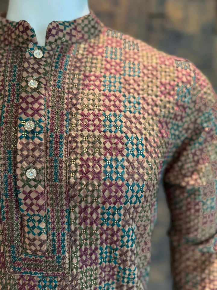 Men’s festive kurta with intricate weaving, golden accents, and comfortable viscose texture. Stylish cultural wear kurta showcasing teal, maroon, and olive motifs with gold shimmer.