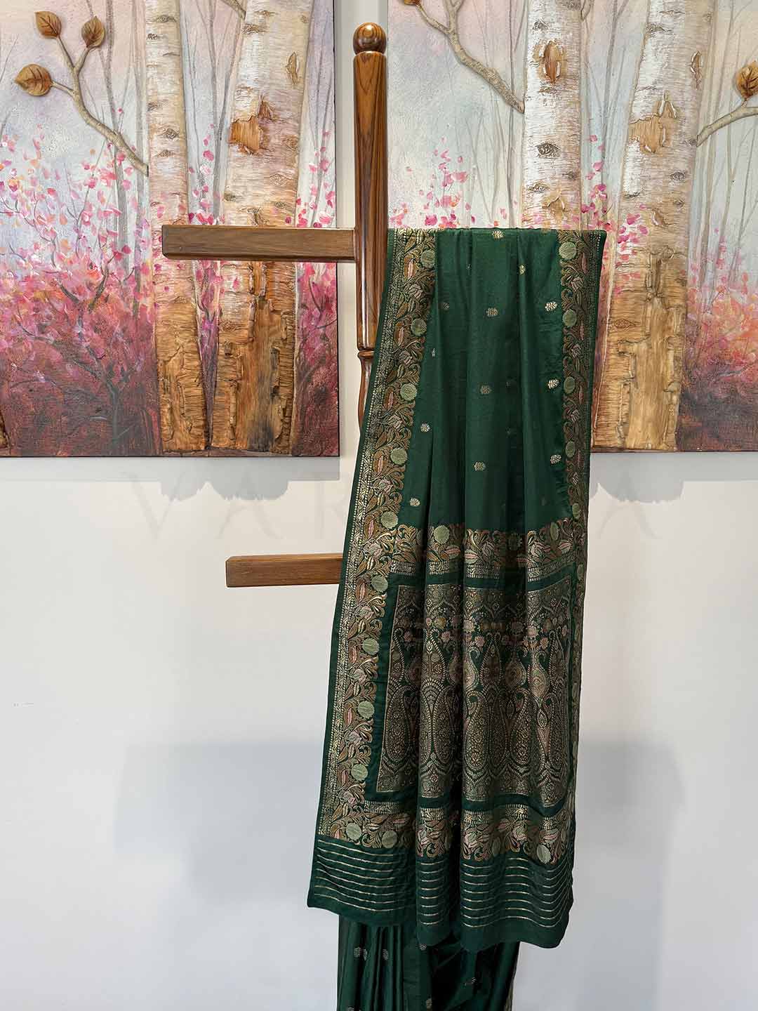 Traditional Castleton Green satin saree with Jamawar weaving, offering a festive and luxurious look for special occasions.