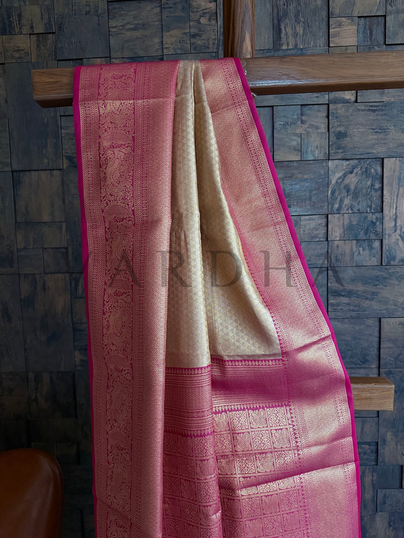 Elegant front view of saree with champagne gold and magenta contrast for festive wear