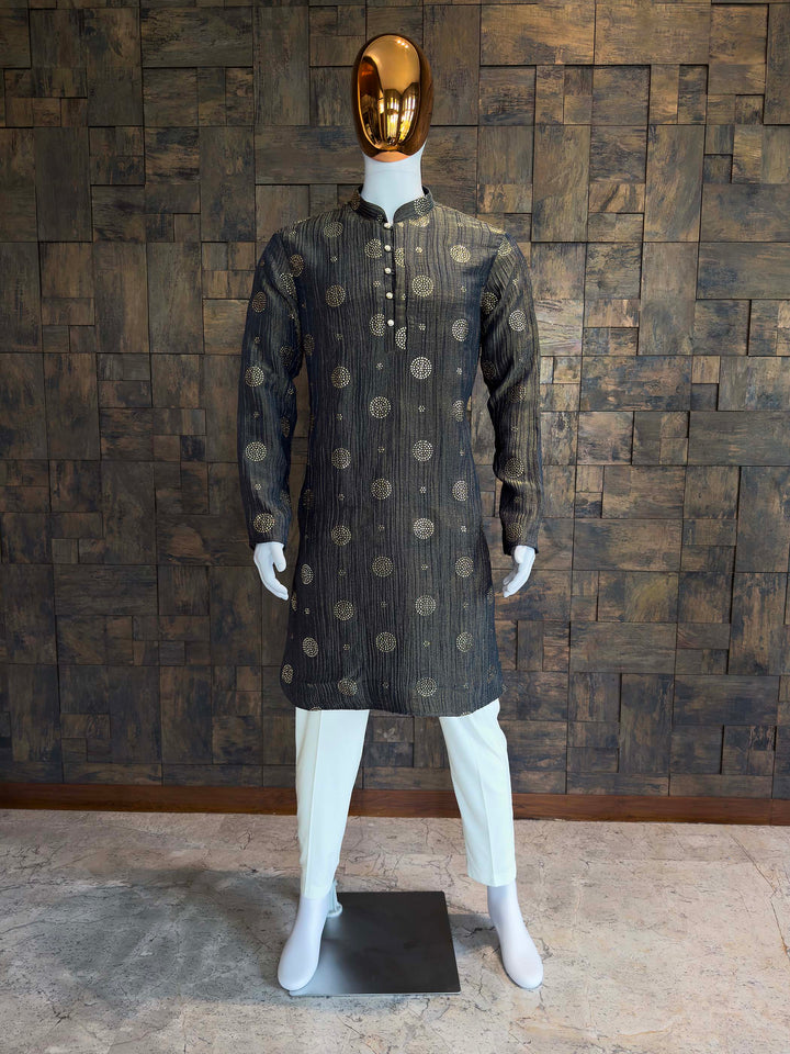 Men's Crushed Viscose Kurta in Blue with Gold Embellished Polka Dots for Wedding Party. Mannequin wearing a dark patterned kurta against a wooden paneled wall.