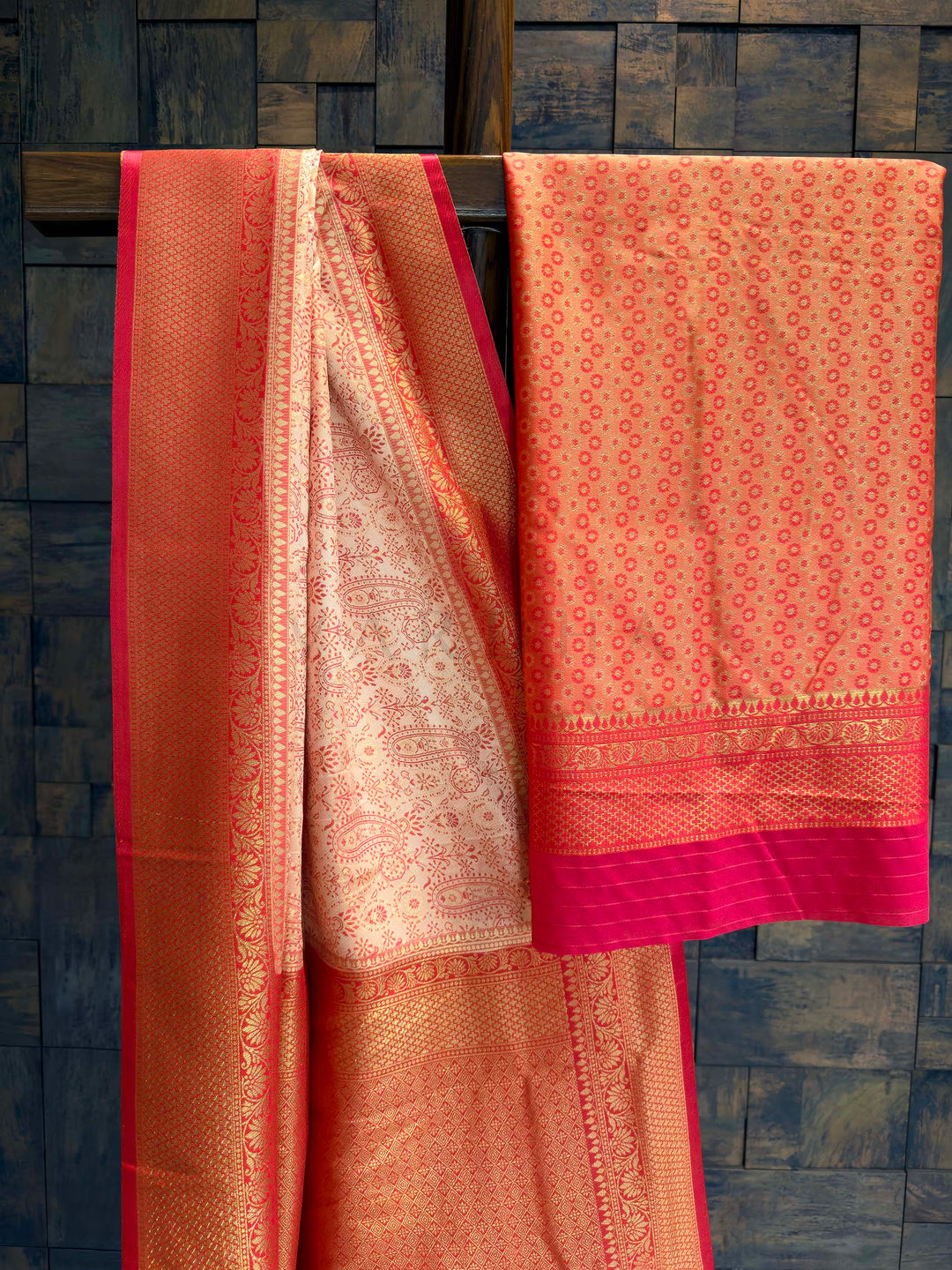 Saree with matching deep red blouse piece featuring all-over zari paisley buttis.
