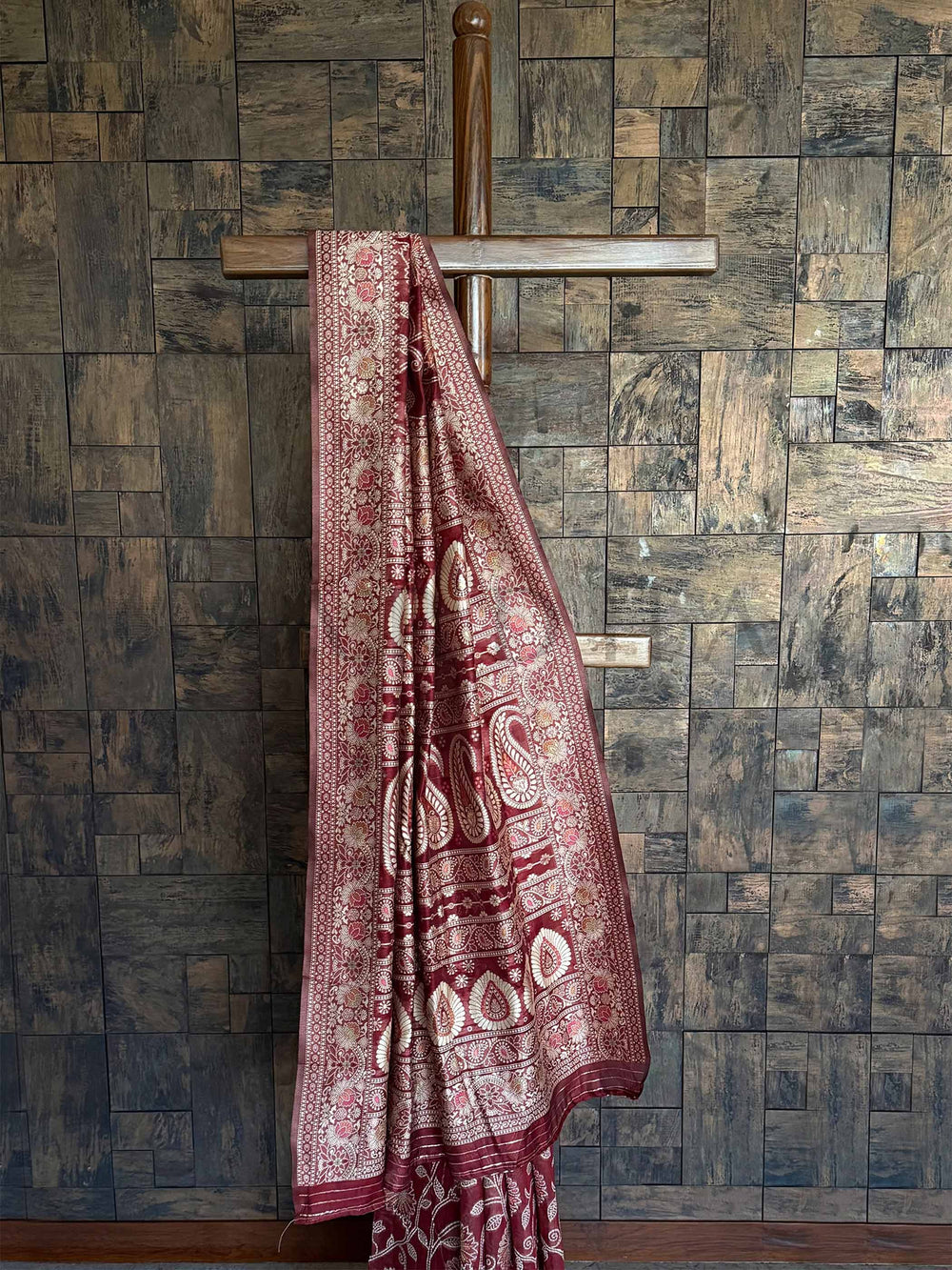 Elegant Maroon Georgette Saree adorned with Exquisite Chikankari Embroidery and a Matching Blouse, perfect for Traditional Gatherings and Special Events.

