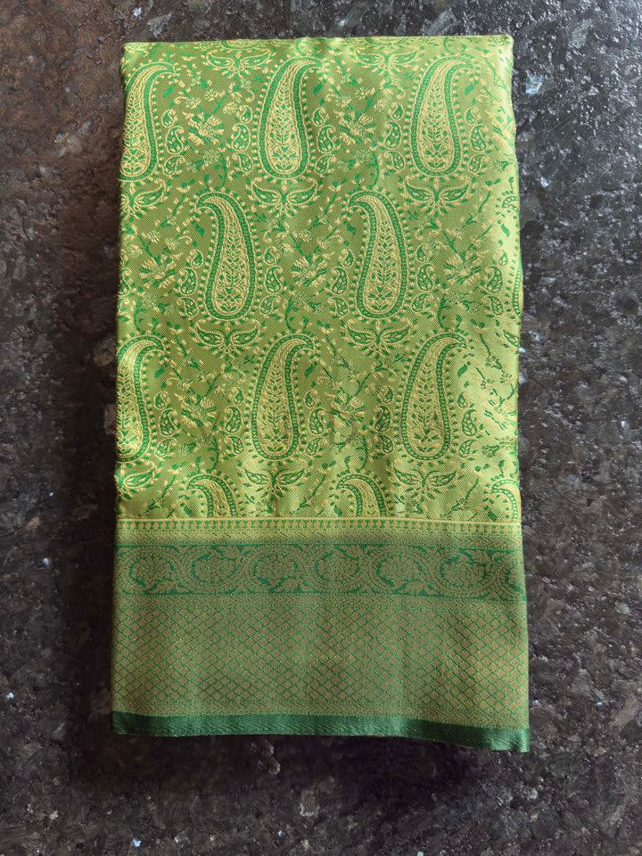 Folded view highlighting the sheen and intricate Tanchoi weave of the satin fabric.