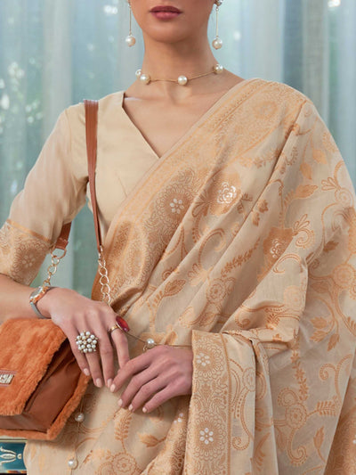 Elegant French Beige Chikankari Georgette Saree adorned with Intricate Lucknowi Weaving, perfect for Bridal Wear and Cultural Celebrations.

