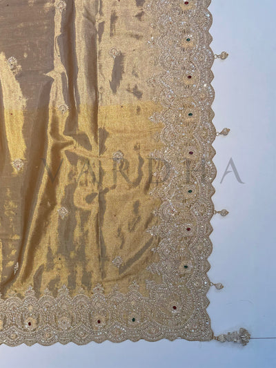 Pallu view showing delicate scalloped edges and artistic zari weaving on Tissue Kanjivaram Saree.
