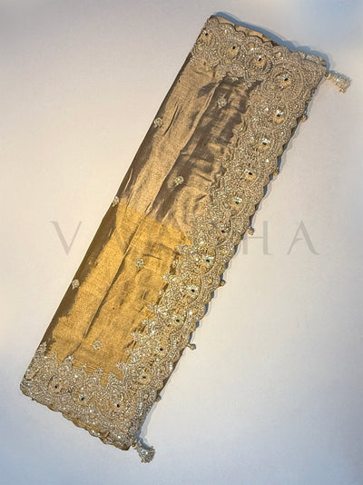Detailed view of scalloped border with zari embroidery and sequins on Off White Kanjivaram Tissue Saree.
