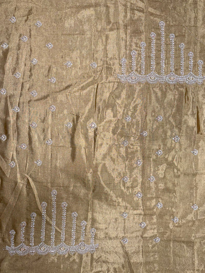 Close presentation of Off White Kanjivaram Saree with grand motifs and floral patterns.

