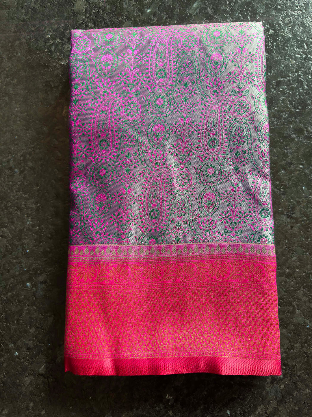 Folded view highlighting the sheen and texture of the Tanchoi Satin Silk fabric.