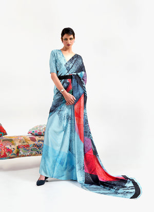 Ice blue and ebony red digital printed soft crepe saree with Bollywood drape and floral patterns, perfect for festive occasions.