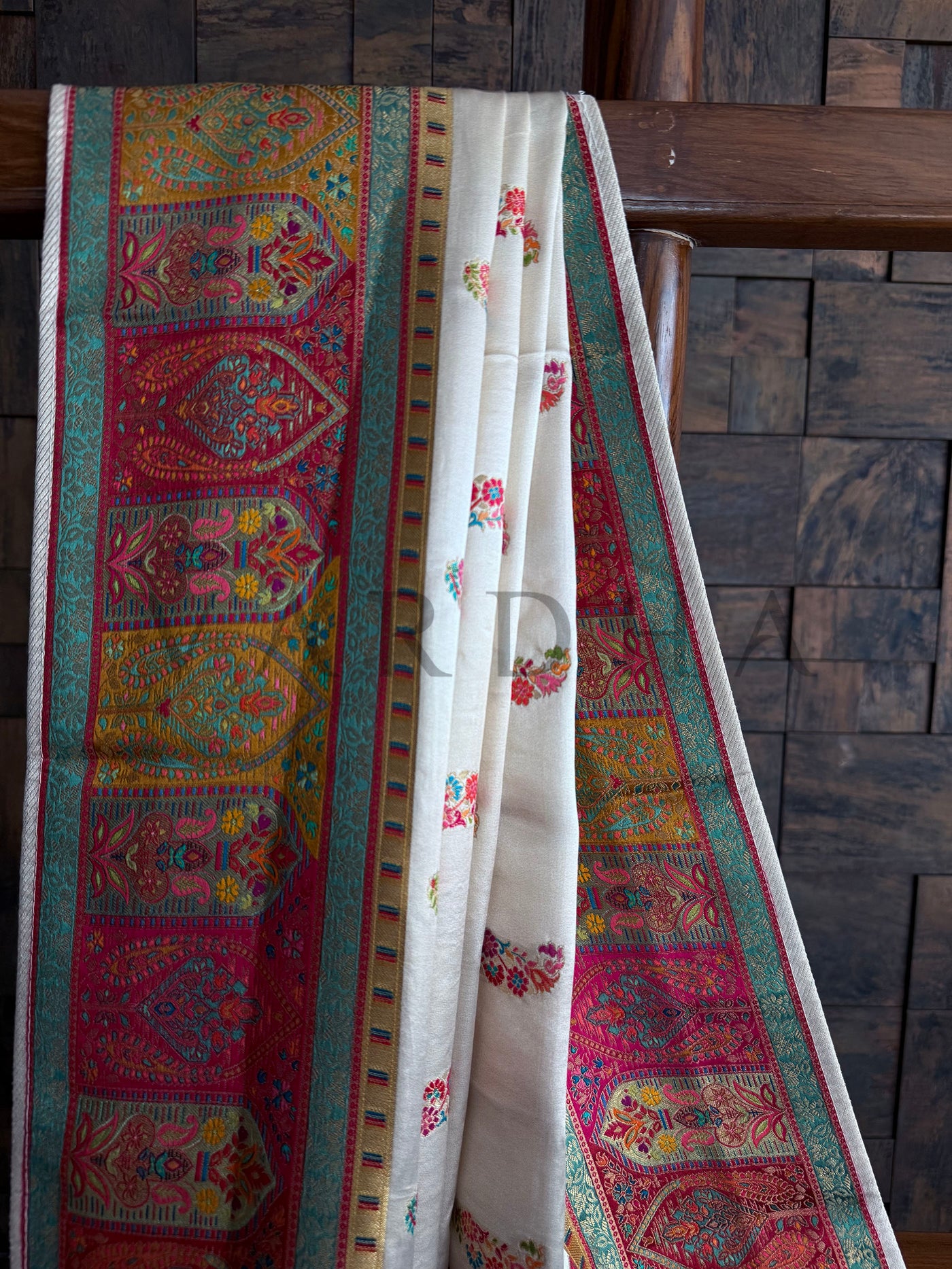 Heritage Paisley Border on White Silk Saree with Intricate Woven Finish

