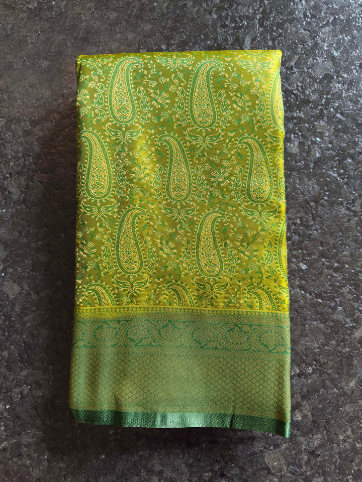 Folded view highlighting the sheen and intricate Tanchoi weave of the satin fabric.