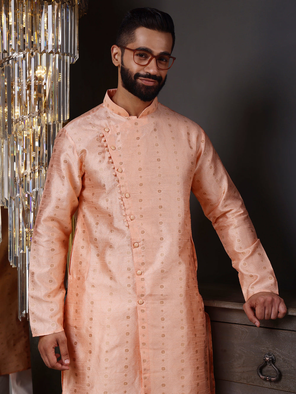 Luxurious peach jacquard kurta for men, featuring a modern angrakha design, perfect for weddings