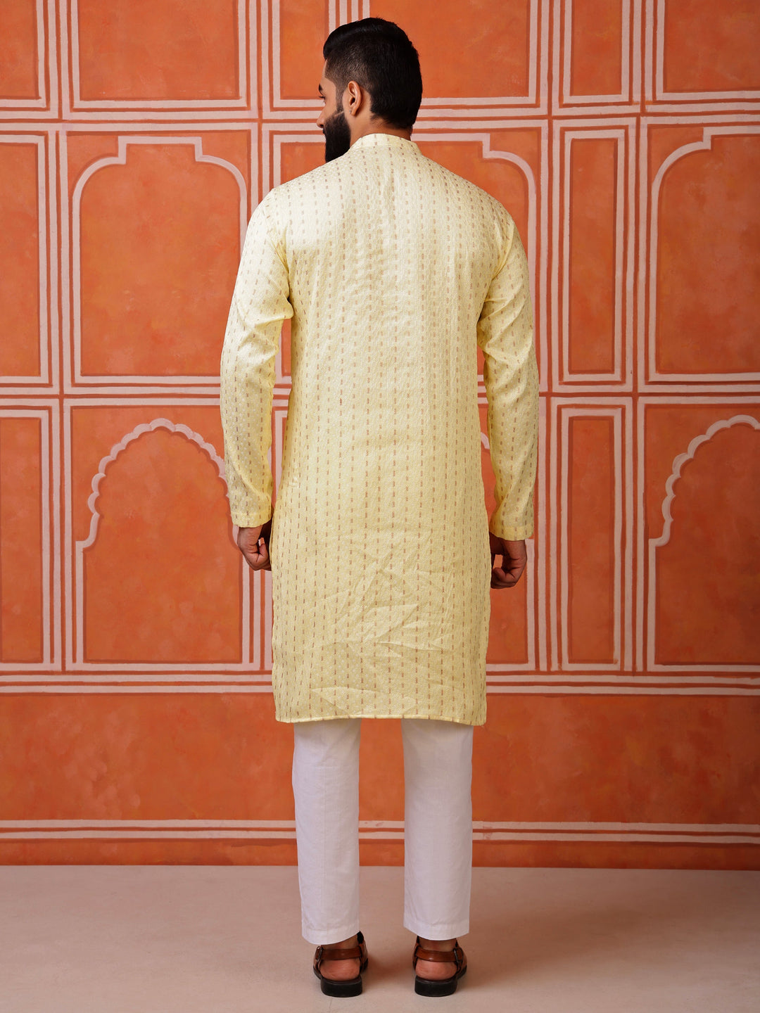 Breathable light yellow traditional kurta for men, an excellent choice for daytime celebrations