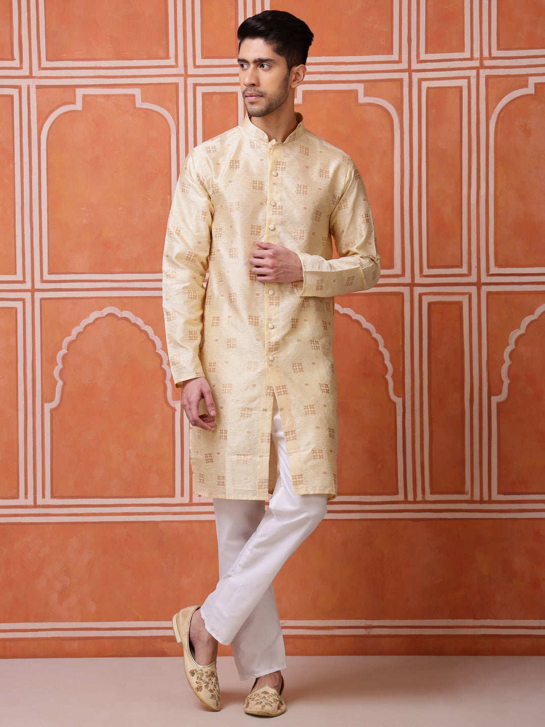 Men's elegant beige silk blend kurta featuring woven floral buti motifs