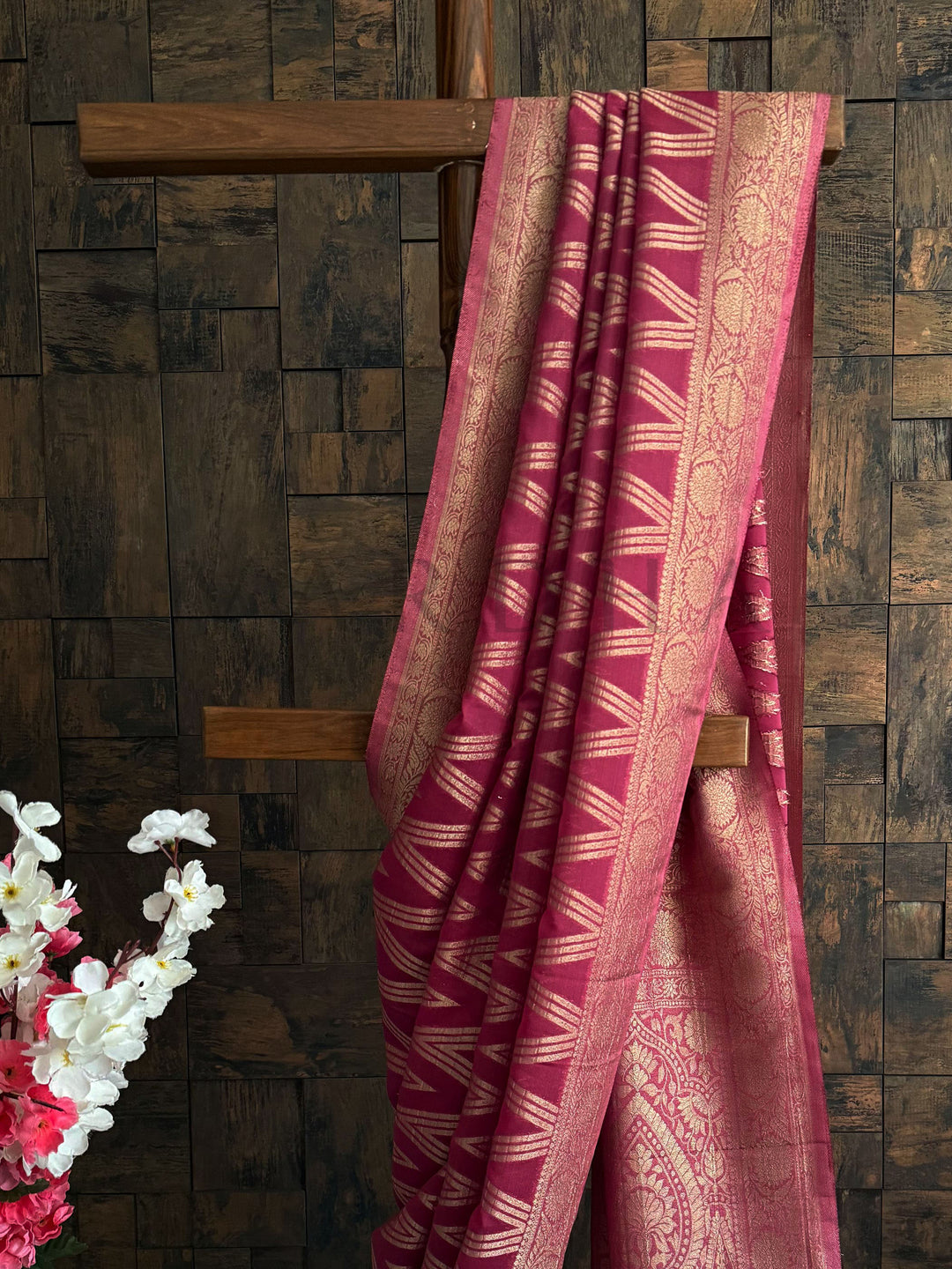 Lightweight georgette saree with rose pink base and ethnic motifs – perfect festive drape.

