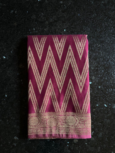 Traditional rose pink georgette saree with luxe zari work and rich blouse piece.

Soft drape partywear georgette saree in elegant rose pink with handcrafted gold borders.