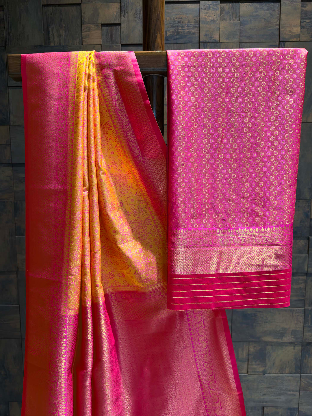 Saree with matching Hot Pink blouse piece featuring all-over zari floral buttis.