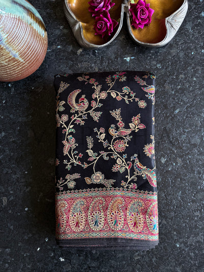 Folded View of Midnight Black Saree with Embroidered Floral and Peacock Motifs
