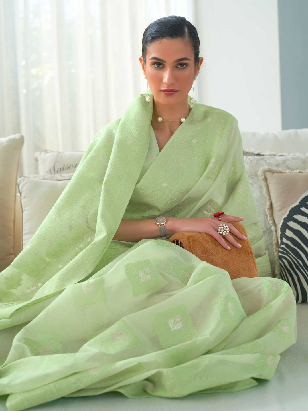 Luxurious Mint Green Lucknowi Chikankari Silk Saree showcasing Delicate Hand Embroidery, an excellent choice for Festive Gatherings and Special Occasions.

