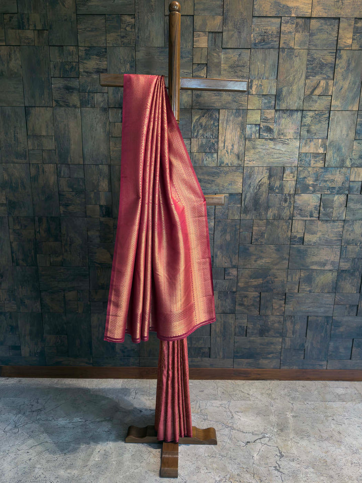 Full drape view of Magenta Wine Kanjivaram Soft Silk Saree with vertical stripes on mannequin.