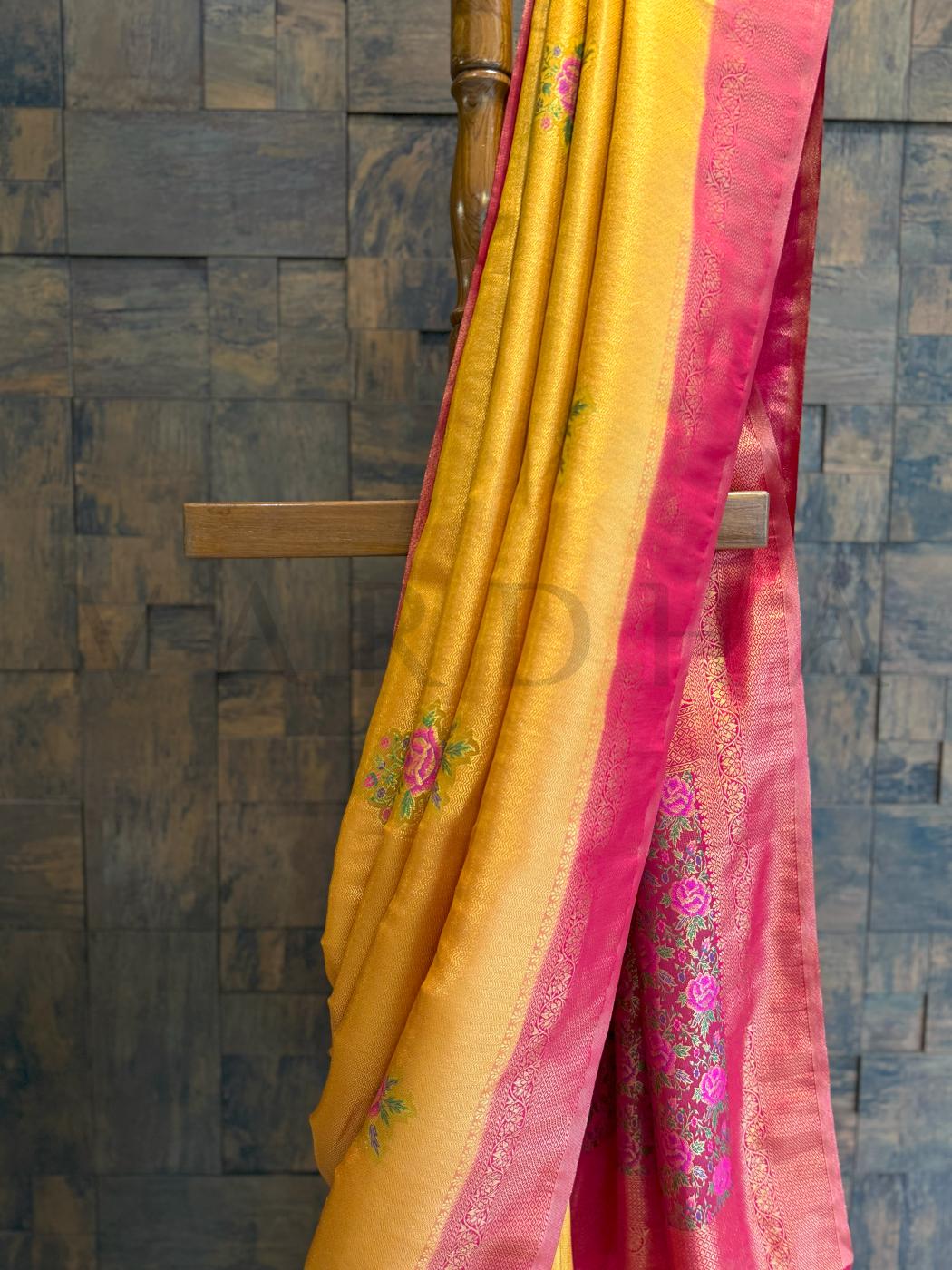 Digitally woven kalamkari floral pallu over rani pink silk extension finished with zari edge., Matching blouse in rani pink with golden zari for perfect contrast ethnic styling with mustard saree
