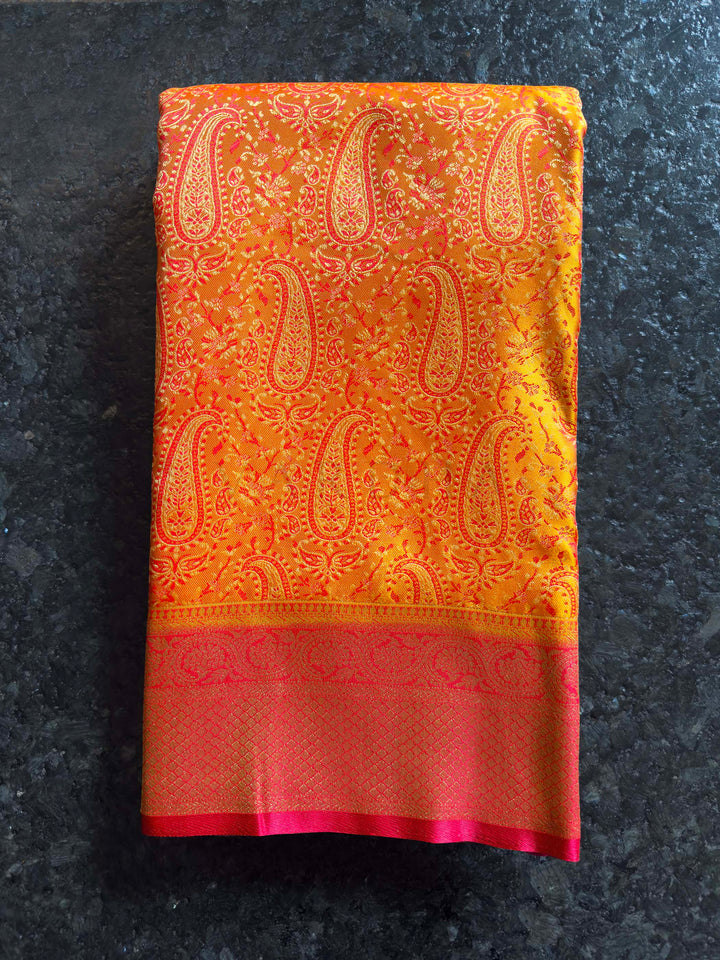 Folded view highlighting the sheen and intricate Tanchoi weave of the satin fabric.